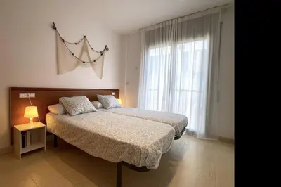 Cama o camas de una habitación en LETS HOLIDAYS Nice apartment near beach Tossa 2
