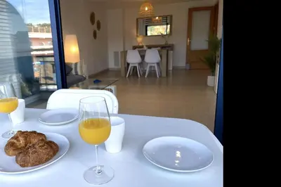 Una televisión o centro de entretenimiento en LETS HOLIDAYS Nice apartment near beach Tossa 2