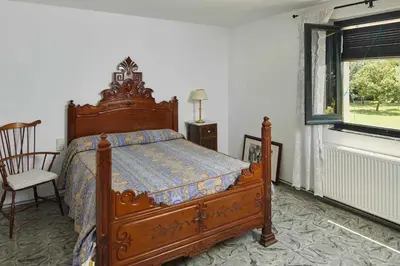 Cama o camas de una habitación en Rural house with pool in Cassà de la Selva