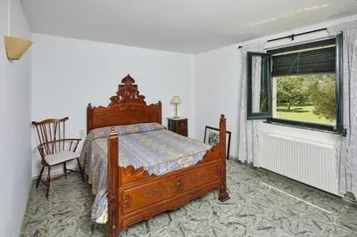 Cama o camas de una habitación en Rural house with pool in Cassà de la Selva