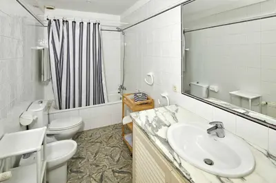 Un baño de Rural house with pool in Cassà de la Selva