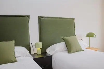 Cama o camas de una habitación en Torre dels Bous Apartaments