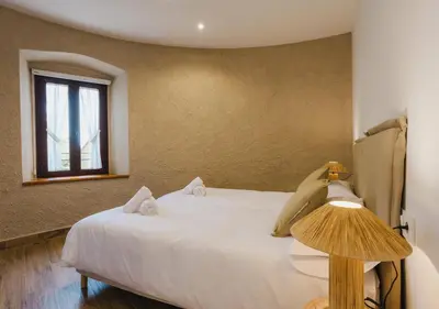 Cama o camas de una habitación en Torre dels Bous Apartaments