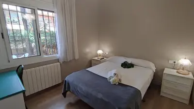 Cama o camas de una habitación en VILLAS COSETTE Apartamento BENET