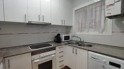 Una cocina o zona de cocina en VILLAS COSETTE Apartamento BENET