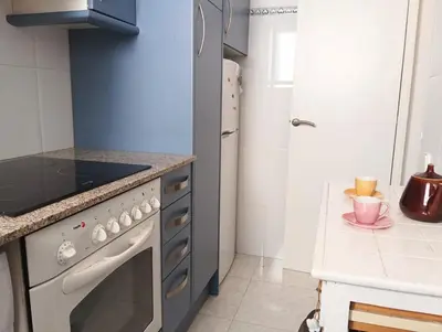 Una cocina o zona de cocina en VILLAS COSETTE Apartamento MAR BELLA 31