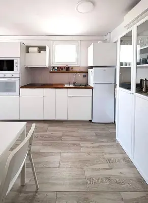 Una cocina o zona de cocina en Maravilloso ático en primera línea del mar