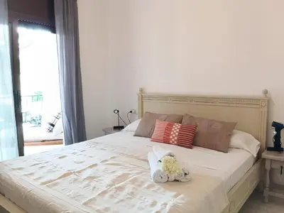 Cama o camas de una habitación en Apartamento Luminoso Cerca de la Playa en Platja d'Aro con Parking Incluido - ES-209-96