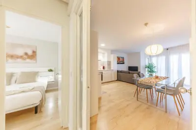 Cama o camas de una habitación en Bravissimo Pedret, Barri Vell apartment