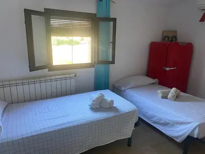Cama o camas de una habitación en Charming village house for families & cyclists
