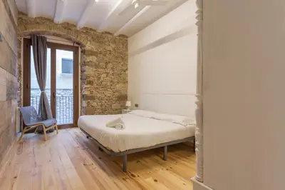 Cama o camas de una habitación en AS Sant Domènec Pool&Bike