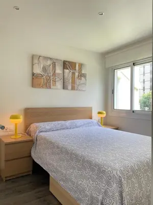 Cama o camas de una habitación en Familiar apartamento Platja d'Aro