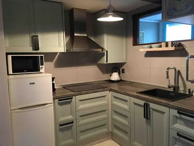 Una cocina o zona de cocina en Alojamiento Ada