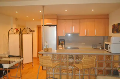 Una cocina o zona de cocina en Acogedor