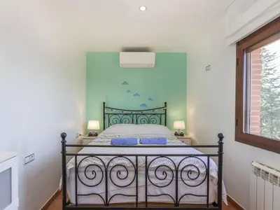 Cama o camas de una habitación en Holiday Home Perla by Interhome