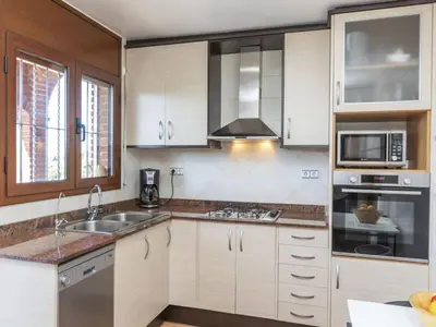 Una cocina o zona de cocina en Holiday Home Perla by Interhome