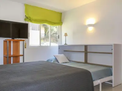 Cama o camas de una habitación en Apartment Sol Pins Tamariu by Interhome