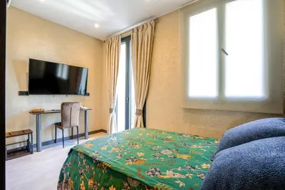 Una televisión o centro de entretenimiento en SJ7 Aparthotel