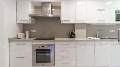 Una cocina o zona de cocina en Posidonia Suite - Amplio apartamento junto al mar