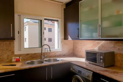 Una cocina o zona de cocina en WELCS APARTAMENTO 289 PDA con piscina comunitaria