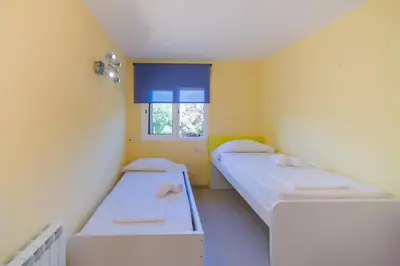 Cama o camas de una habitación en WELCS APARTAMENTO 289 PDA con piscina comunitaria