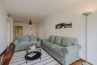 Zona de estar de Apartamento Carlemany con tres habitaciones dobles