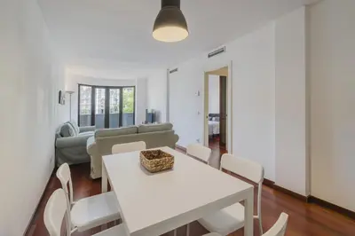 Zona de estar de Apartamento Carlemany con tres habitaciones dobles