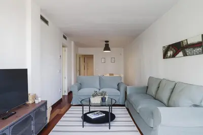 Zona de estar de Apartamento Carlemany con tres habitaciones dobles