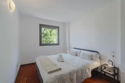 Cama o camas de una habitación en Apartamento Carlemany con tres habitaciones dobles
