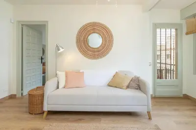 Zona de estar de Calma de Mar Apartamento con encanto a 3 min del mar Palamos
