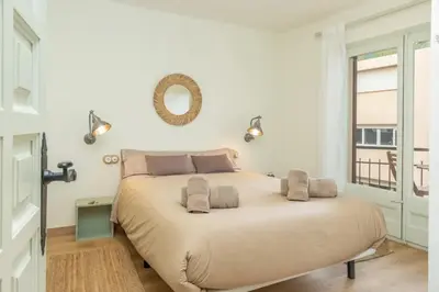 Cama o camas de una habitación en Calma de Mar Apartamento con encanto a 3 min del mar Palamos
