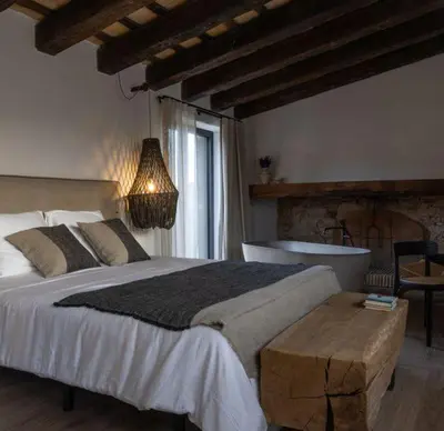 Cama o camas de una habitación en Mas Escarrà