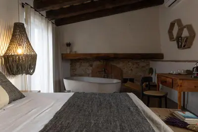 Cama o camas de una habitación en Mas Escarrà