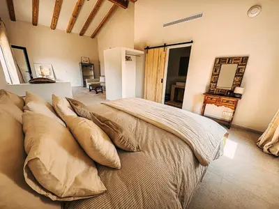 Cama o camas de una habitación en Mimosa Lodge