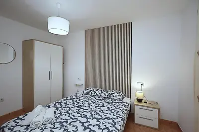 Cama o camas de una habitación en Apartamento Tahiti