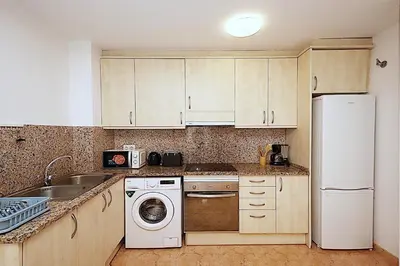 Una cocina o zona de cocina en Apartamento Tahiti