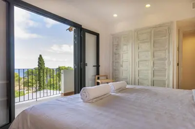 Cama o camas de una habitación en Cala Nostra Bea