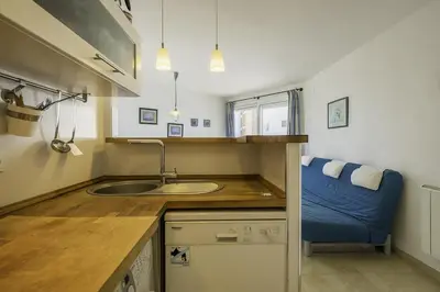 Una cocina o zona de cocina en Apartamento con vistas al mar en Platja d'Aro