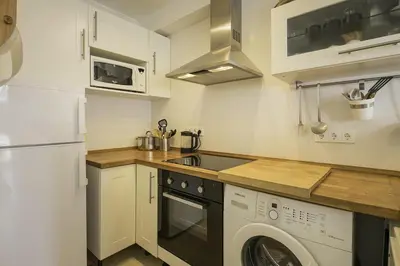 Una cocina o zona de cocina en Apartamento con vistas al mar en Platja d'Aro