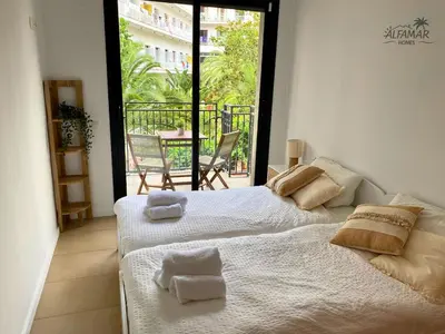 Cama o camas de una habitación en Brezza Suite - Modern Apartment with Swiming Pool