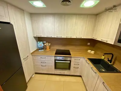 Una cocina o zona de cocina en Brezza Suite - Modern Apartment with Swiming Pool