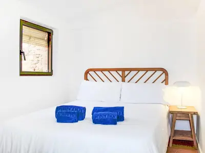 Cama o camas de una habitación en Holiday Home Can Caritat by Interhome
