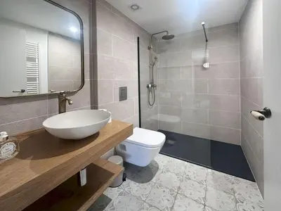 Un baño de Holiday Home Can Caritat by Interhome
