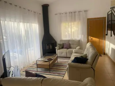 Zona de estar de Com Casa Nostra