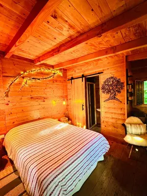 Cama o camas de una habitación en Nature Tree House