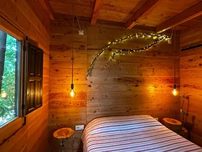 Cama o camas de una habitación en Nature Tree House