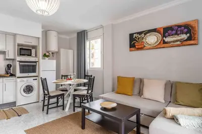 Una cocina o zona de cocina en Tic Tac 23 Family apartment with pool view