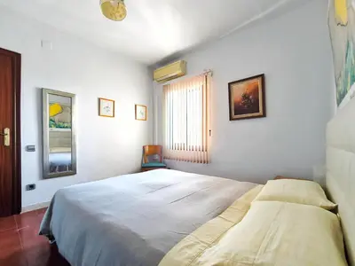 Cama o camas de una habitación en Apartamento Canet de Mar Playa, Costa de Barcelona