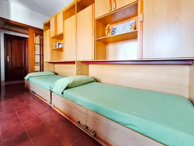 Cama o camas de una habitación en Apartamento Canet de Mar Playa, Costa de Barcelona