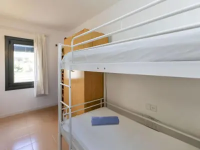 Cama o camas de una habitación en Apartment Coto Faisán Sun & Nature by Interhome